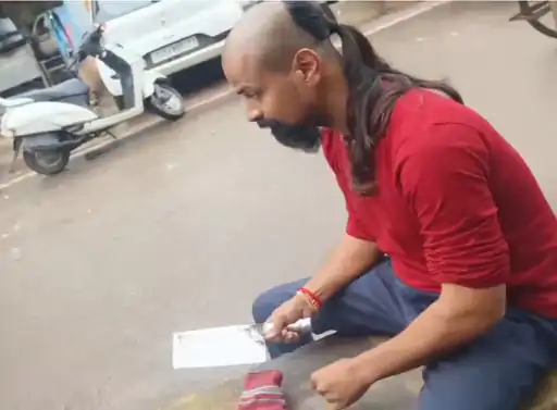 Youth cuts finger for cow rights